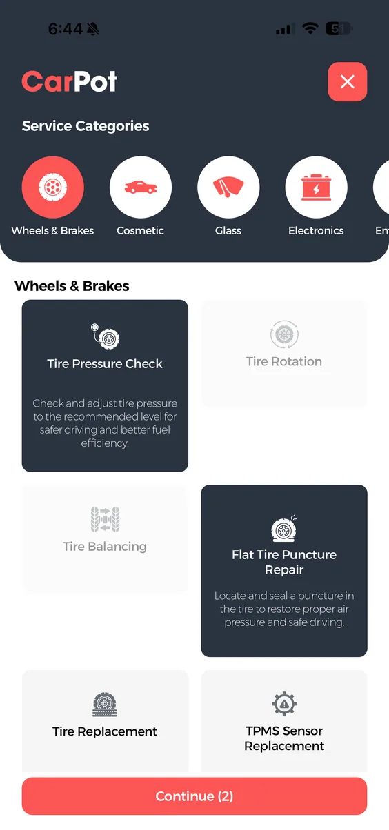 Choosing a service category in the CarPot app, with specific jobs such as tyre pressure check and flat tyre puncture repair.
